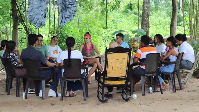 Community leaders in a circle during a training.